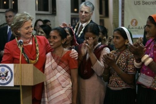 Secretary Clinton interacts with members of the Self Employed Women's Assn 7/18/09(AP Photo/Rajanish Kakade)